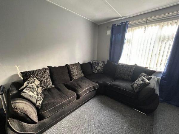 Image 2 of Black large fabric corner sofa