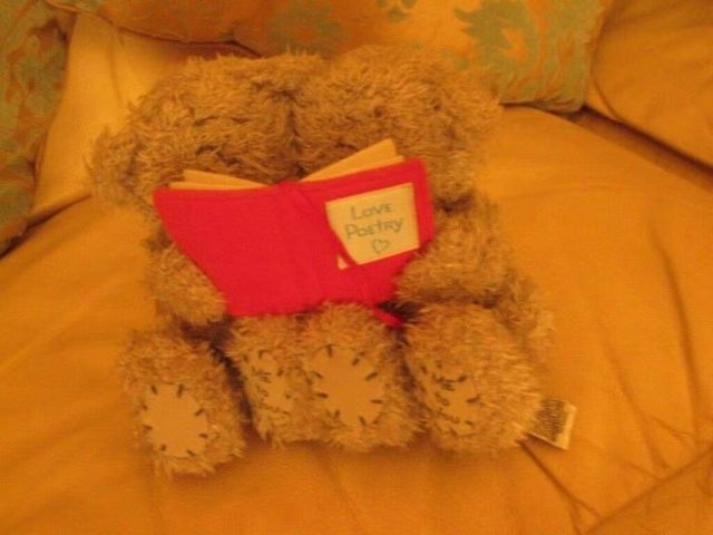 Preview of the first image of Me to you Tatty Bears holding a poetry book.