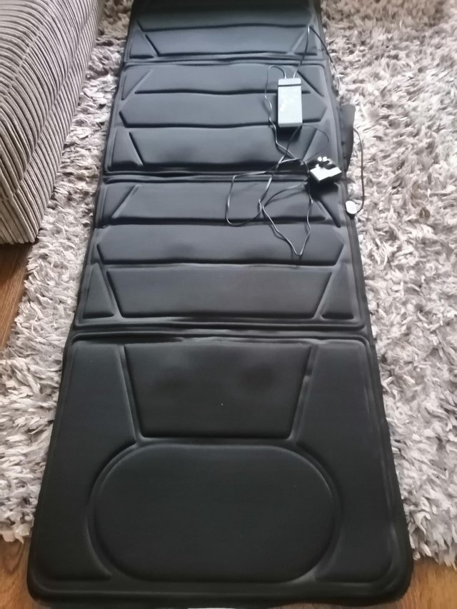 Preview of the first image of Massage mat, heat and various settings..