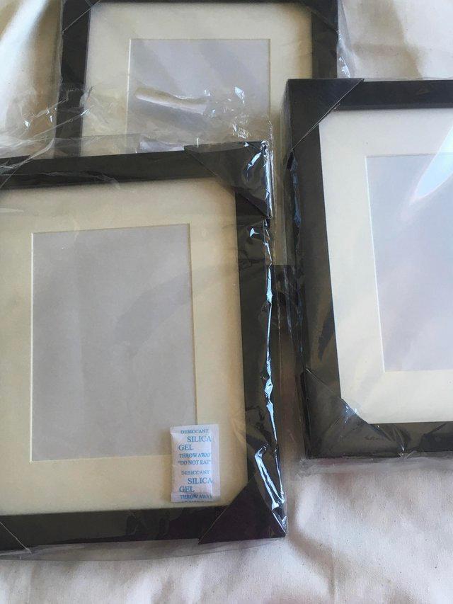 Preview of the first image of Three new picture/photograph frames.