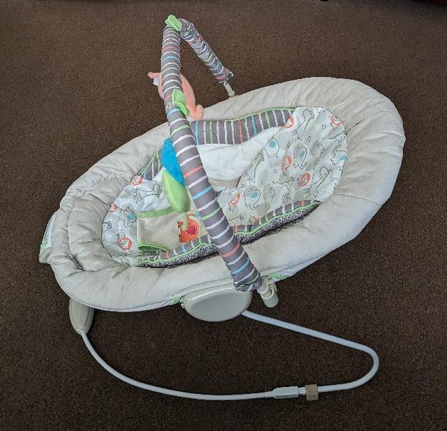 Preview of the first image of Lovely Jungle Themed Baby Bouncer With Vibration & Sounds.