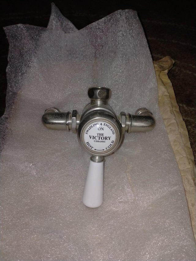 Preview of the first image of Shower control unit with integrated shower head.