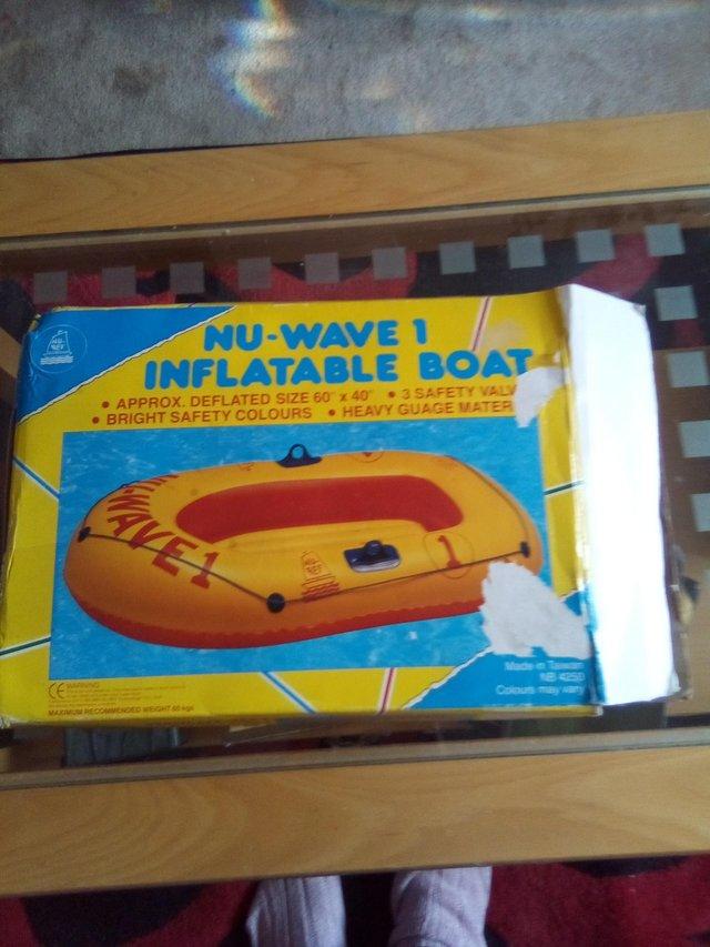 Preview of the first image of NU-WAVE 1 inflatable yellow and red dinghy.