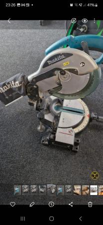 Image 3 of Makita MLS100 mitre saw with blade