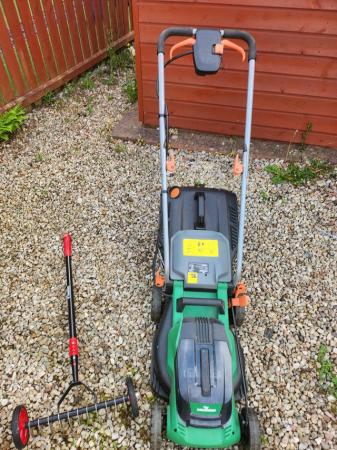 Image 1 of Lawnmower with handheld scarifier with 2 batteries.