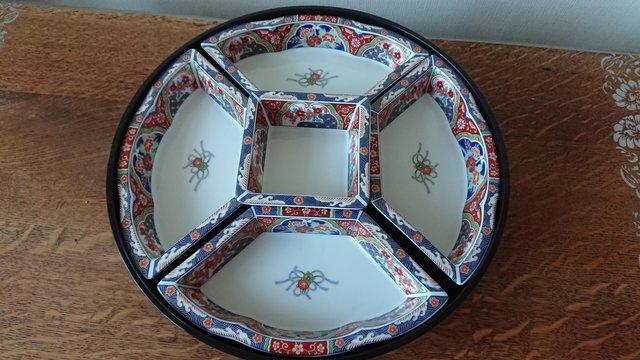 Preview of the first image of Oriental ceramic lazy susan/platter.