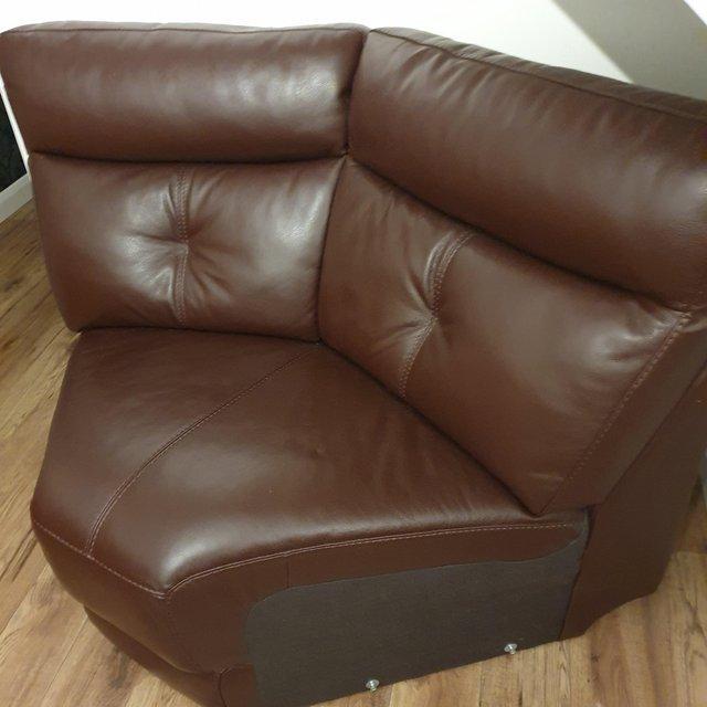 Preview of the first image of DFS - London brown leather corner piece sofa.