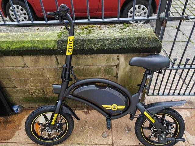 Preview of the first image of Electric scooter that looks like a bike.