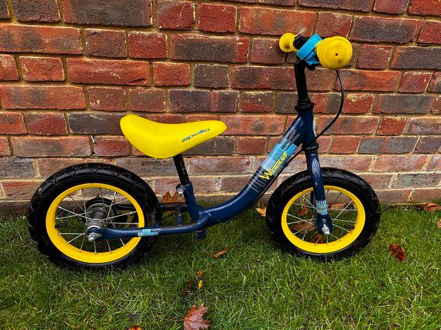 Preview of the first image of Apollo Wizzer Balance Bike- 2/3 year old Blue/yellow.
