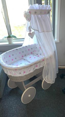 Image 1 of Grey Whicker wheels Moses basket