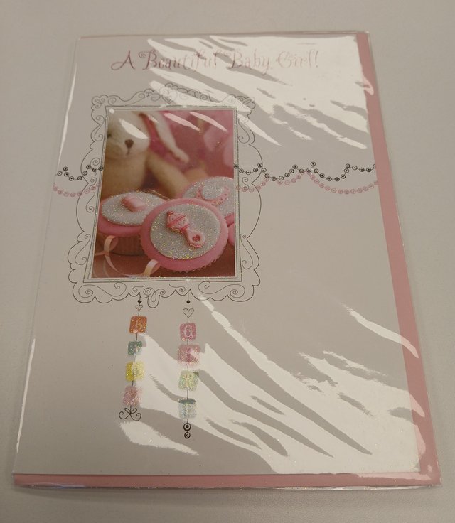 Preview of the first image of New baby girl card with envelope.