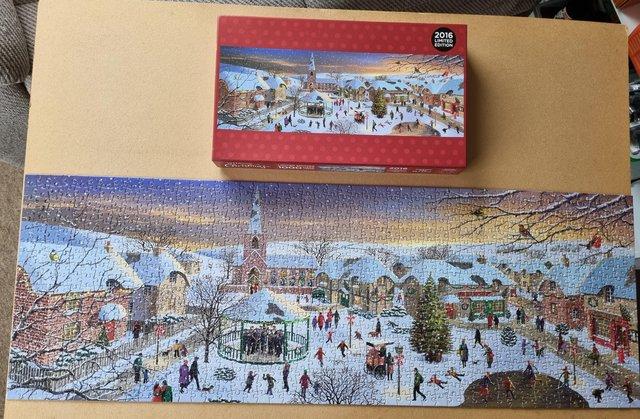Image 3 of 1000 piece jigsaw called A FESTIVE CHRISTMAS VILLAGE BY W H