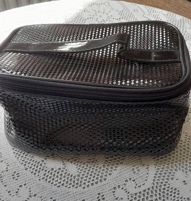 Preview of the first image of Shiny Black Make-up Bag with handle.