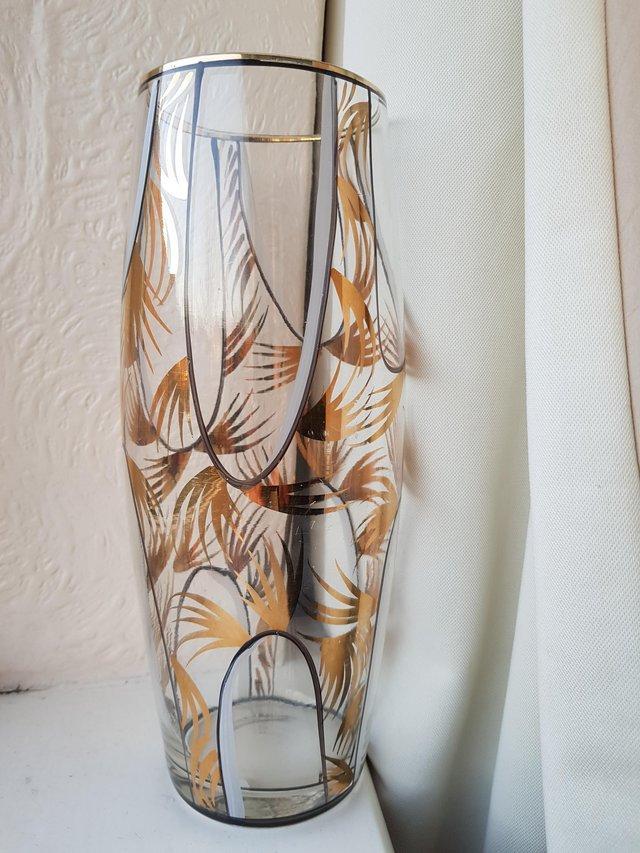Preview of the first image of vintage mid century glass vase with gold palm detail.