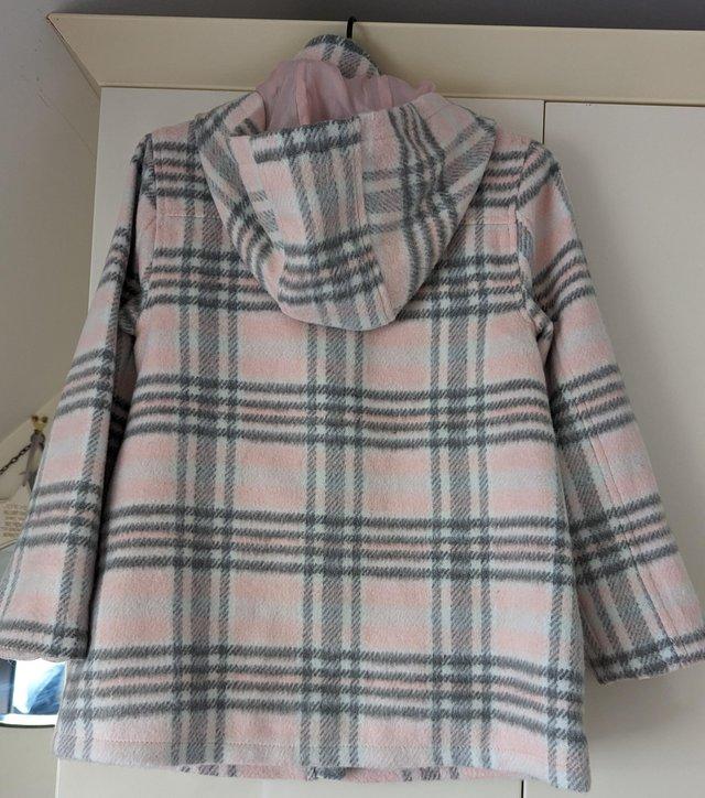 Preview of the first image of Brand new unworn with labels girls winter coat.