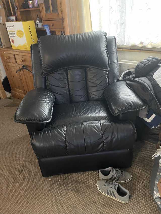 Preview of the first image of Black leather massage chair.