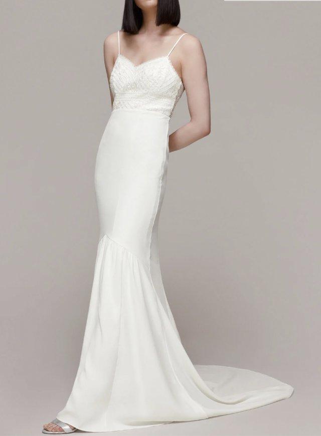 Preview of the first image of WHISTLES SYLVIE EMBROIDERED LACE FISHTAIL WEDDING DRESS.