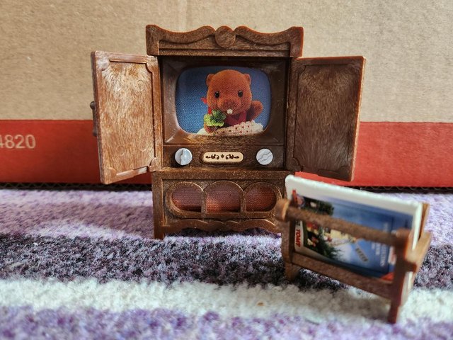 Preview of the first image of Vintage Sylvanian Families tv and magazine rack.