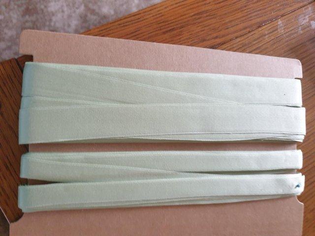Preview of the first image of 100% Peppermint Green Cotton Satin Ribbon.