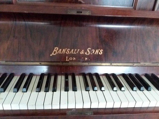 Preview of the first image of Vintage piano Bansali&Sons, brown.