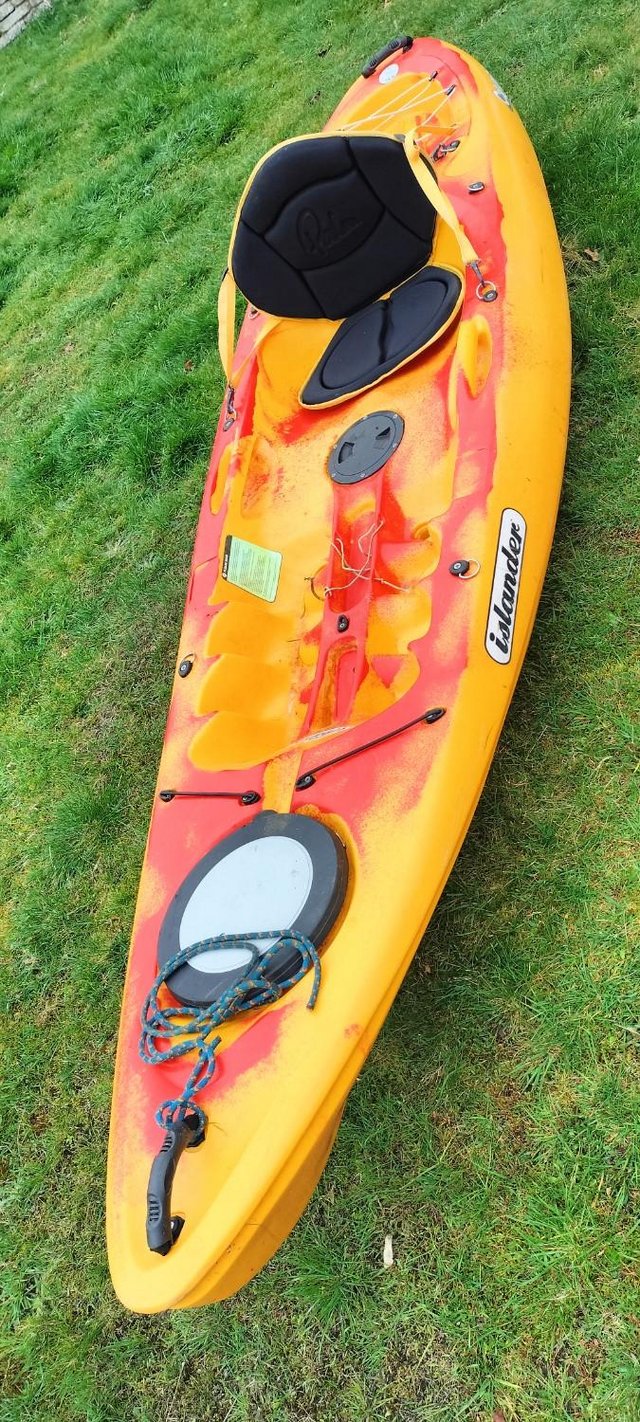 Preview of the first image of Islander Calypso sit on top kayak In Yellow and Red camo.