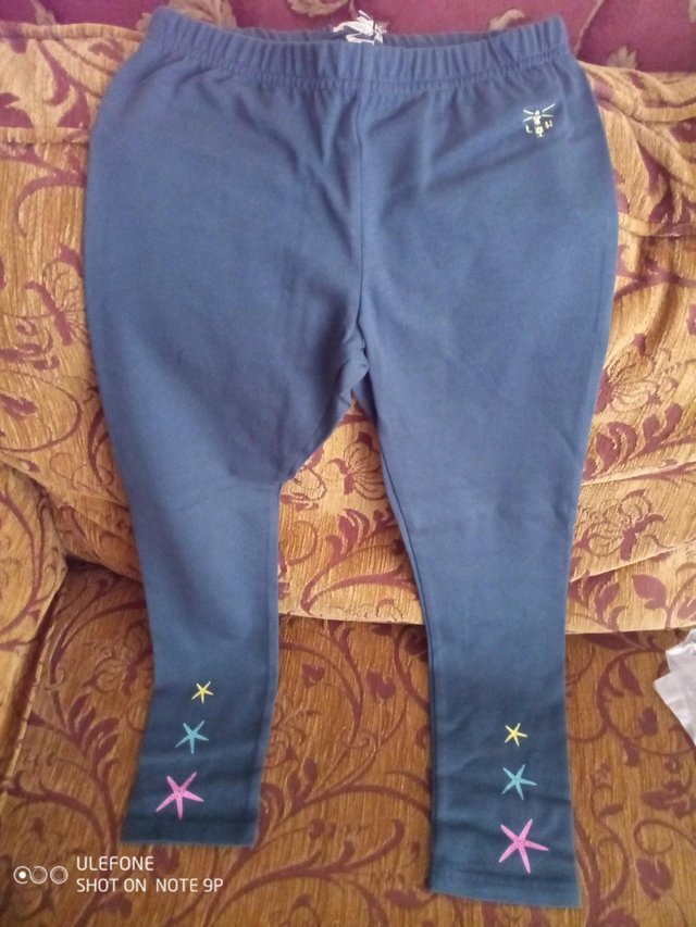Preview of the first image of Lighthouse Girls Navy Starfish leggings, age 7/8 yrs BNWT.