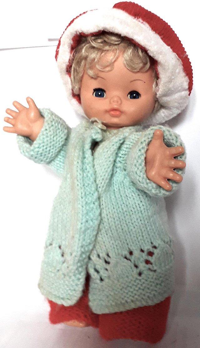 Preview of the first image of 1980's SOFT PLASTIC DOLL - RED / BLUE OUTFIT - 24 cm.