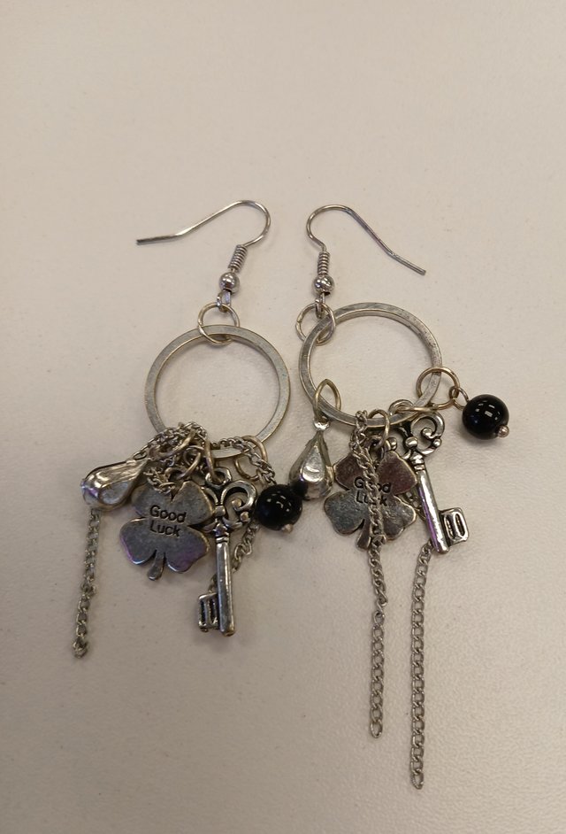 Preview of the first image of Black and silver earrings.