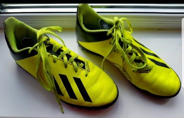 Preview of the first image of Adidas astro football trainers size UK 4.