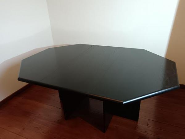 Image 1 of Black ash octagonal expanding dining table.