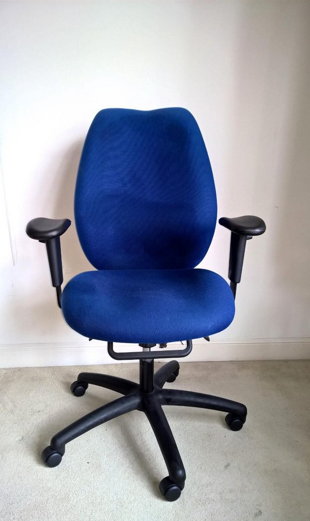 Very comfortable blue upholstered swivel office chair