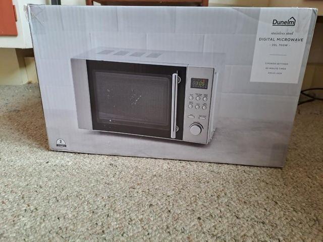Preview of the first image of Dunelm Stainless Steel Microwave Oven.