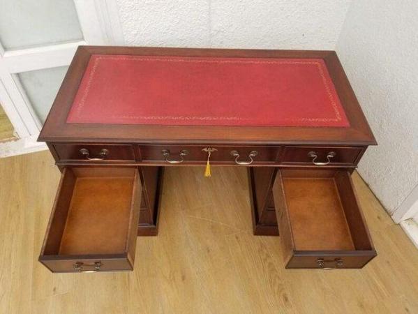 Image 2 of Beautiful ox blood leather and mahogany desk with cabinet.