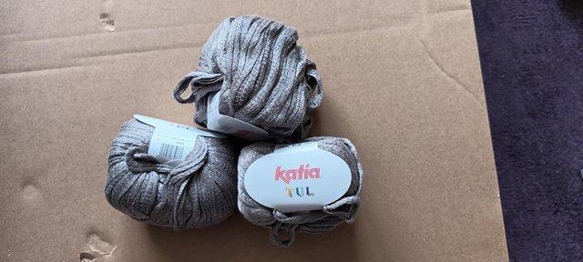Preview of the first image of Katia tul (sole) yarn knits one scarf.