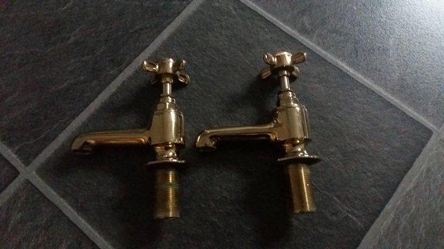 Preview of the first image of Heritage Bathrooms brass bath taps.