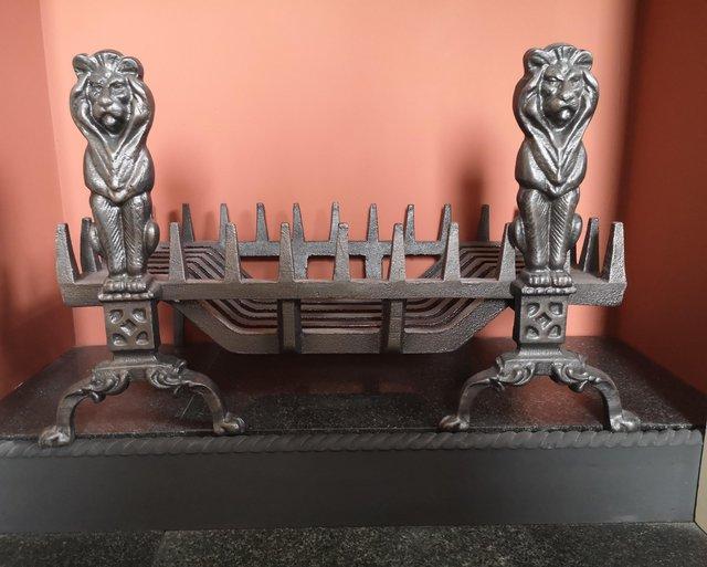 Preview of the first image of Cast iron Fire Dogs and basket for sale.