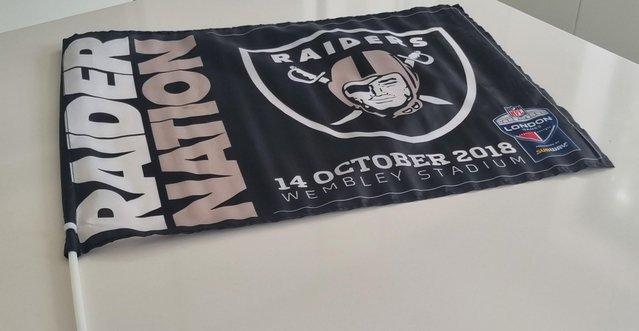 Image 2 of Raider Nation hand held flag made of cloth