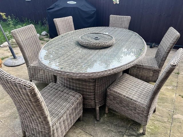 Preview of the first image of ROYALCRAFT RATTAN GARDEN TABLE AND 6 CHAIRS.