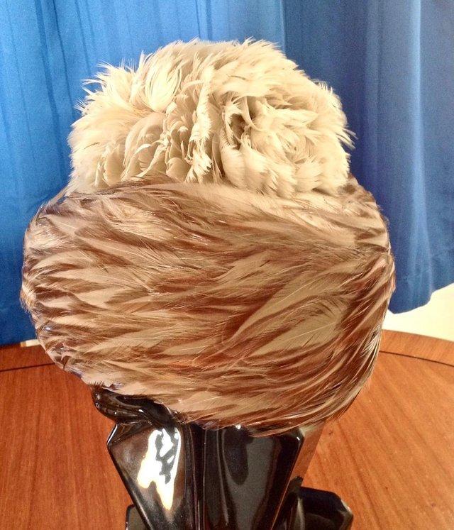 Preview of the first image of Ladies Vintage Brown and Beige Feather Hat (Size) 23 inches..