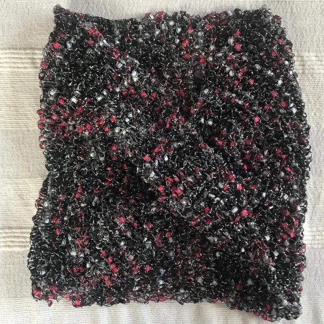 Preview of the first image of Xmas sparkles! Hand-knitted neck 'loop' scarf, sparkly black.