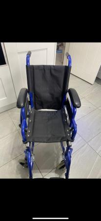 Image 2 of Child’s left leg elevated wheel chair like new