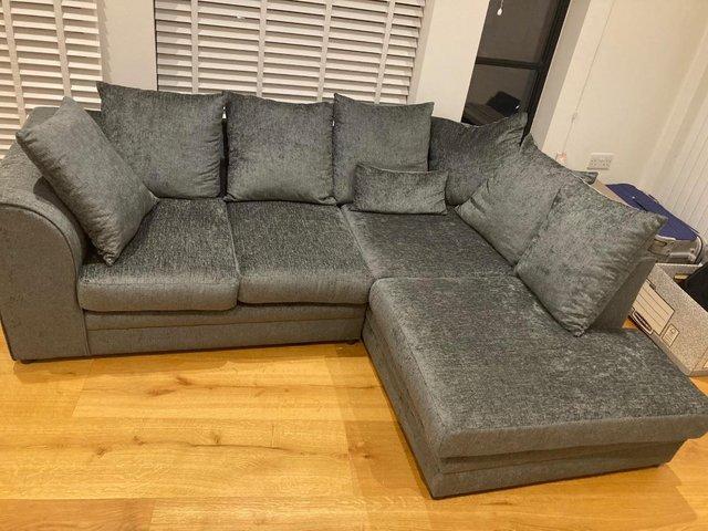 Preview of the first image of Corner sofa - grey colour - Like brand new.