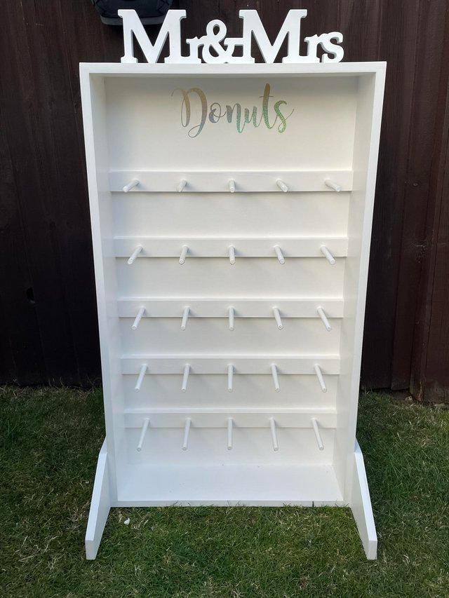 Preview of the first image of Fabulous Donut wall stand for hire.