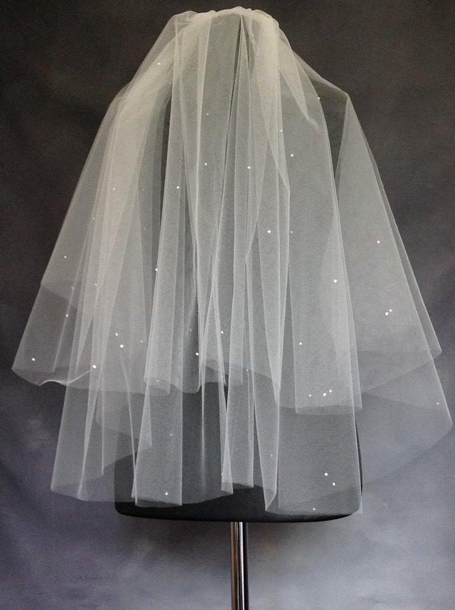 Preview of the first image of 2 Tier Ivory waist length veil with scattered diamantés.