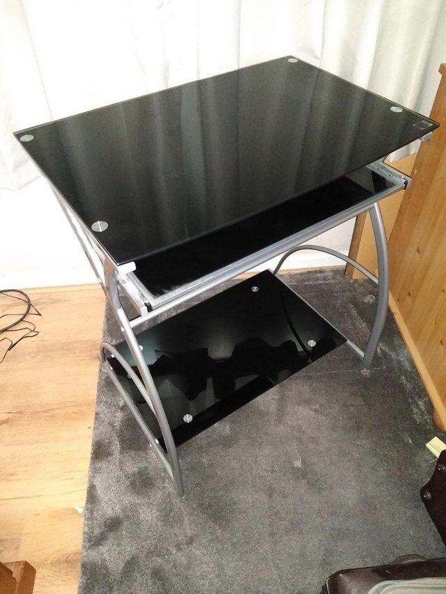 Preview of the first image of for sale glass and metal computer desk.