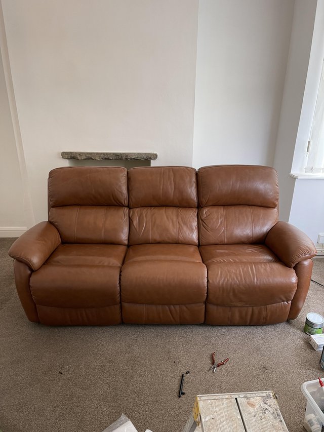 Preview of the first image of Tan leather reclining sofa.