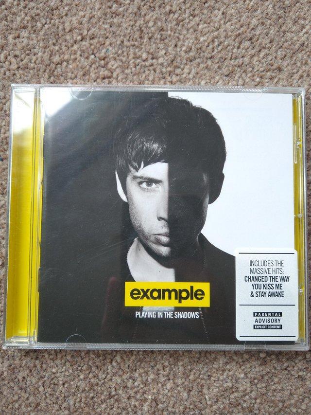 Preview of the first image of 'Playing In The Shadows' by Example (CD, 2011).