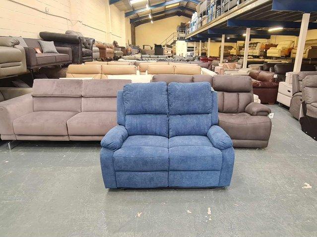 Preview of the first image of New Pancho blue fabic manual recliner 2 seater sofa.