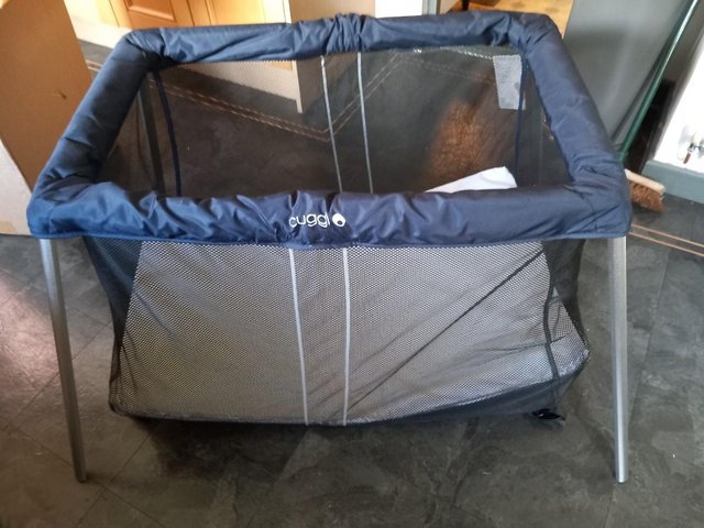 Preview of the first image of Cuggl travel cot for sale.