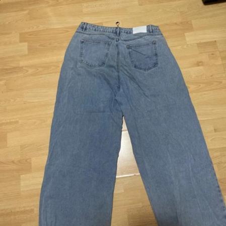 Image 1 of Wide legged missguided jeans